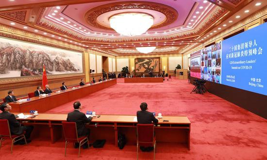 3月26日,国家主席习近平在北京出席二十国集团领导人应对新冠肺炎特别峰会并发表题为《携手抗疫 共克时艰》的重要讲话。