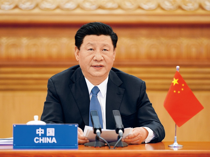 2020年3月26日,国家主席习近平在北京出席二十国集团领导人应对新冠肺炎特别峰会并发表题为《携手抗疫 共克时艰》的重要讲话。 新华社记者 李学仁/摄